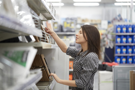 woman working at hardware store