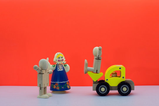A woman with a scarf, a wooden doll, a wooden folklore, a love gift model.