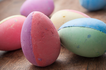 closeup of decorative easter eggs on wooden background