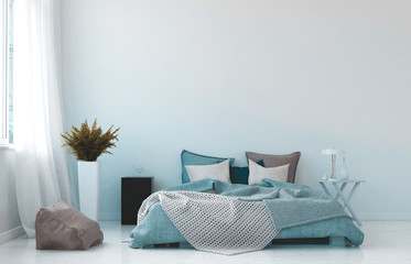 Cool blue and white bedroom interior