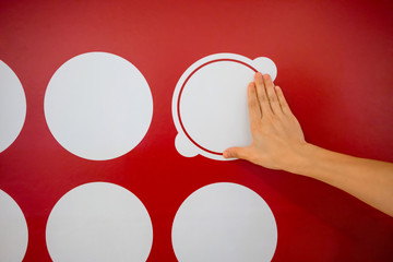 Woman using hands with dot graphic on red wall. Business info graphic interface design.