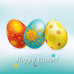 Blue red yellow Easter eggs on the blue background. Blue Easter banner