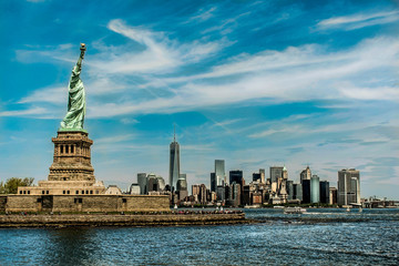 Statue of Liberty Monument in front of New York Skyline colorgrading