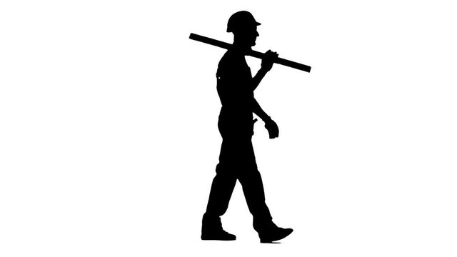 Engineer with a spirit level in his hands goes to the building measurements. White background. Silhouette. Side view