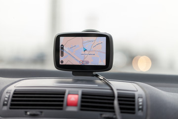 navigation system hangs on a car windshield