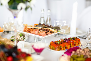 Set the table with different dishes for a Banquet.