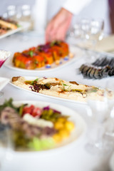 Set the table with different dishes for a Banquet.