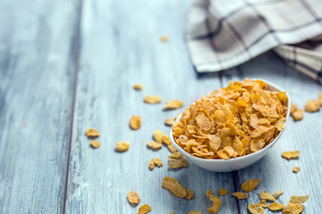 Cornflakes.  Dish of cornflakes on kitchen table