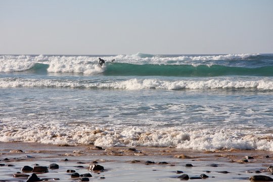 Ocean waves with serfer