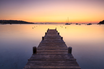Wooden jetty at dawn, sunrise, long exposure, Corsica, France, Mediterranean
