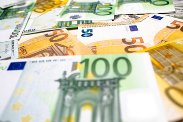 Euro banknotes close up. Several hundred 