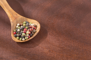 Mixed pepper color on rustic background