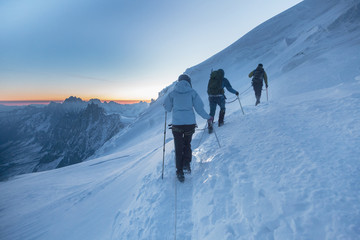 Mountaineering ascending to the top in French Alps. Chamonix, France