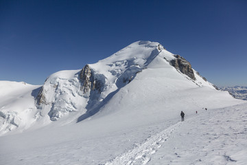 Fototapeta na wymiar Alpinism expedition team is returning home. Mont Blanc, France