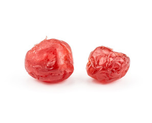 Two red dry cherries isolated on white background in row.