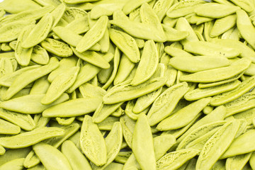 Raw Olive leaves pasta with spinach background wallpaper.