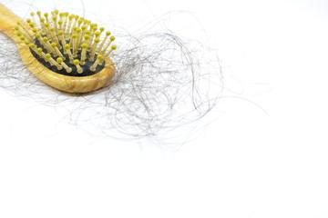 Comb with hair, hair fall everyday serious problem, on white background.