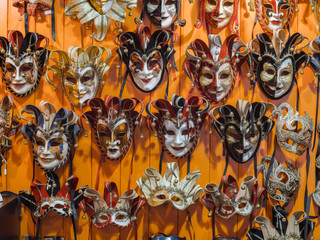 Venetian masks in store display in Venice. Annual carnival in Venice is among the most famous in Europe. Its symbol is the Venetian mask