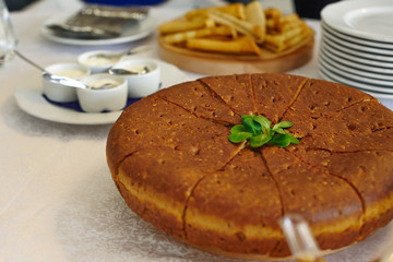 Cut pie on the table, tea, cooked for breakfast