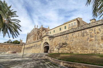 Fototapeta premium Walls and cathedral or La Seu, historic center of Palma, Balearic Islands.