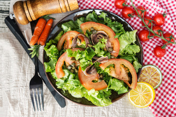 raw fish salad and vegetables fruit