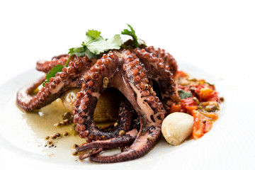 Mediterranean Octopus with vegetables and potatoes