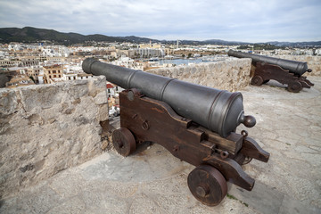 Historic center,Dalt Vila, old canons, walled enclosure of the old town of Ibiza, Balearic Islands.Spain.