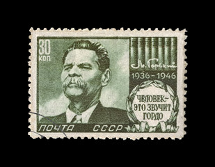Maxim Gorky aka Alexei Maximovich Peshkov, famous Russian writer, dramatist, politician, circa 1946. canceled vintage stamp of USSR (Soviet Union) isolated on black background. 
