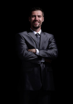 Handsome mature business man isolated on black background