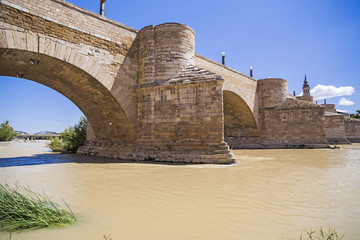 Fototapeta na wymiar Stone bridge, Puente de piedra over Ebro river, Zaragoza, Spain.