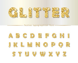 Golden glitter font isolated on white. Modern decorative alphabet for festive design. Girly.