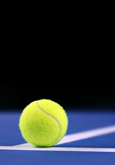 .tennis ball on a tennis court