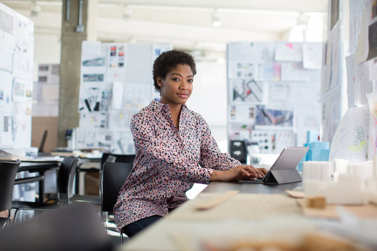Portrait of african american female working in creative office