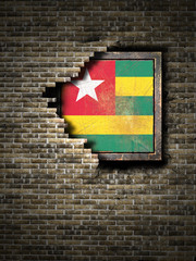 Old Togo flag in brick wall