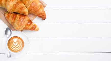 coffee croissant view from above wooden background white
