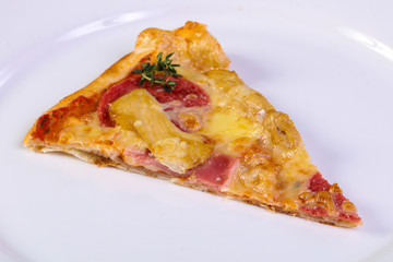 Pizza with ham and sausages