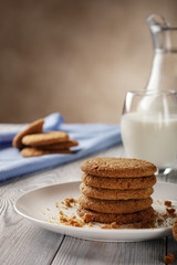Fototapeta na wymiar Healthy breakfast. Oatmeal cookies with milk.