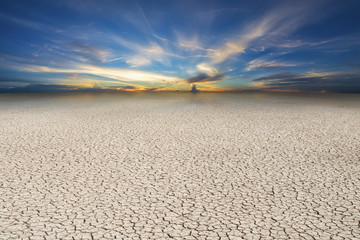 Landscape cracked soil, earth desert terrain with sunset sky