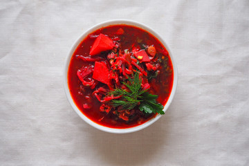 Borscht. Red soup in bowl. Close-up. Top view.
