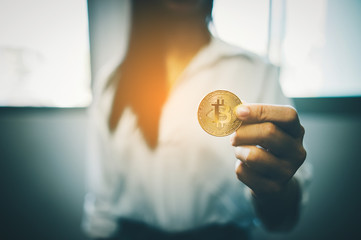 Gold Bitcoin mint in one hundred dollar banknotes. Virtual Money Business Ideas