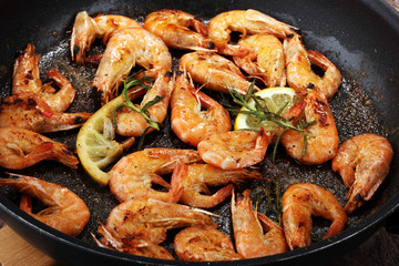 Grilled shrimp skewers. Seafood, shelfish. Shrimps Prawns skewers with herbs, garlic and lemon.