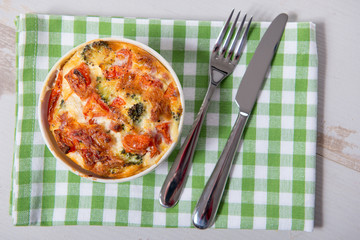 quiche lorraine in small white bowl
