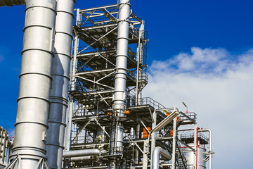 Industrial zone,The equipment of oil refining,Close-up of industrial pipelines of an oil-refinery plant,Detail of oil pipeline with valves in large oil refinery.