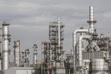 Industrial zone,The equipment of oil refining,Close-up of industrial pipelines of an oil-refinery plant,Detail of oil pipeline with valves in large oil refinery.