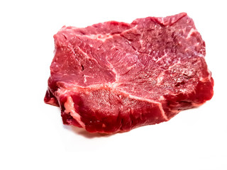 Different, alternative steaks of marbled beef on white background with shadow.