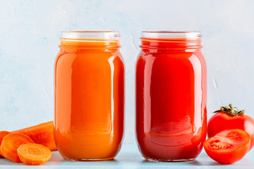 Orange/red colored smoothies / juice in a jar