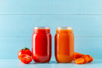 Orange/red colored smoothies / juice in a jar