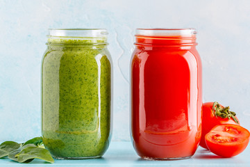 Green/red colored smoothies / juice in a jar