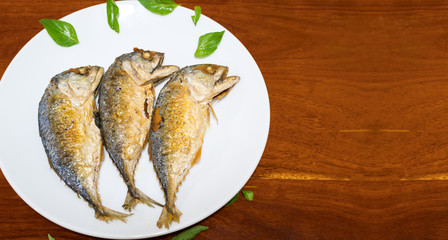 Mackerel fish to fry and then placed in a dish.To prepare and to eat food that is easy to eat and...