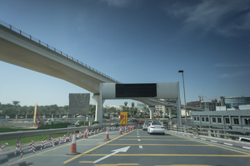 New asphalt road in a modern city. Cars on the highway